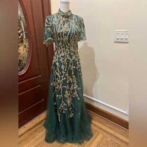 Emerald green heavily beaded gown